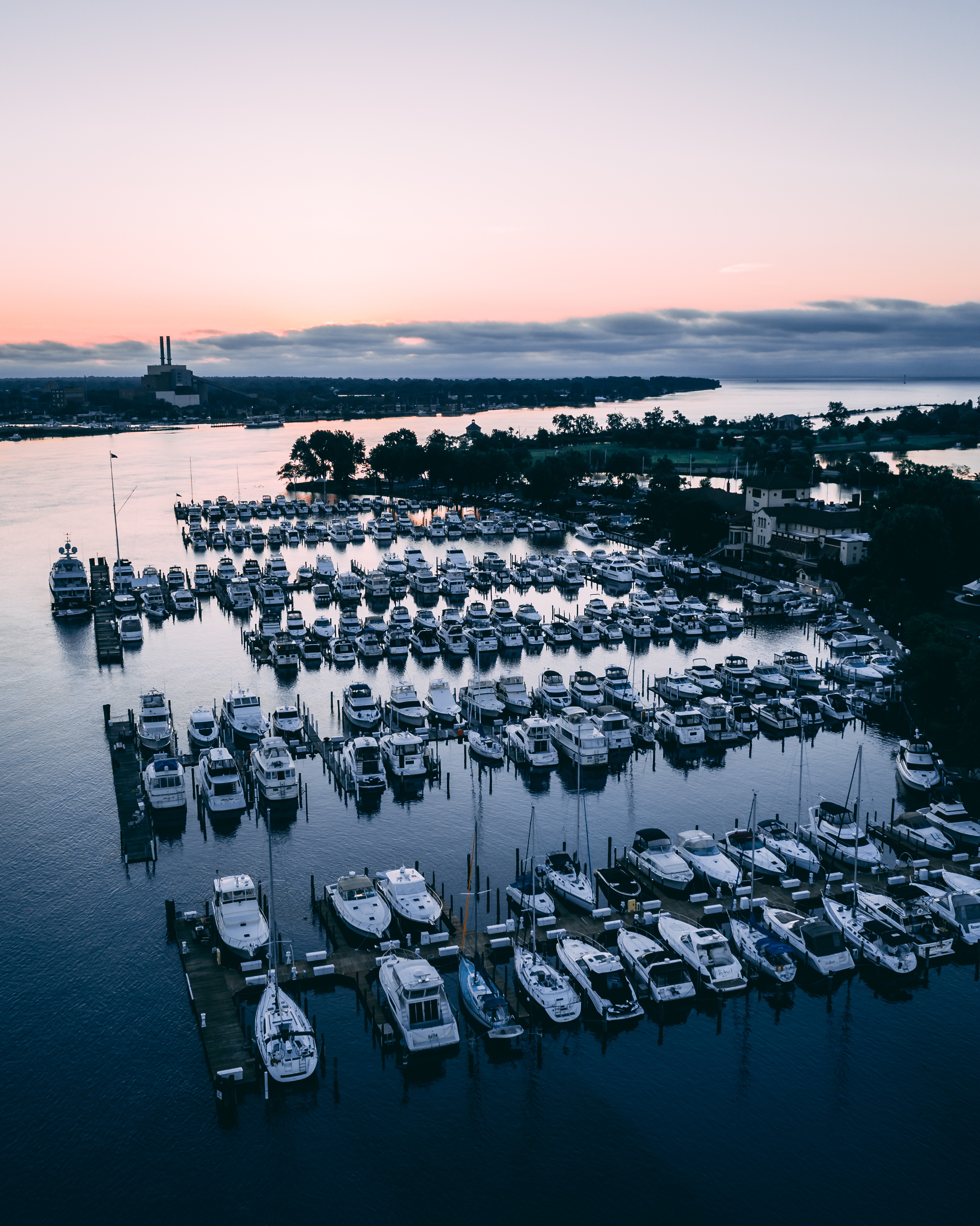 white-ships-river-surrounded-by-greenery-towns-sunset.jpg